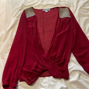 Red L top with beading on shoulders